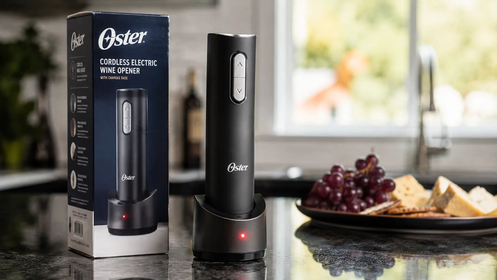 Oster cordless electric wine bottle opener sitting next to its box on a kitchen counter with the charge light blinking